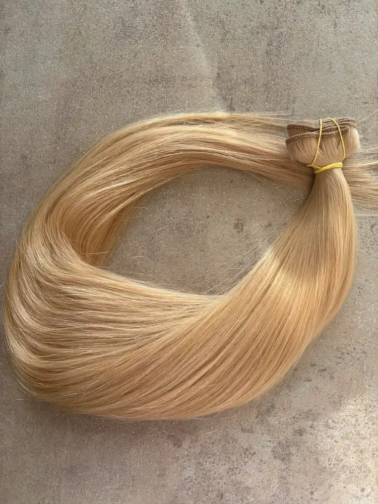 Sötétbézs 100% emberi hajból készült csatos haj kb. 110-115 gr 60 cm